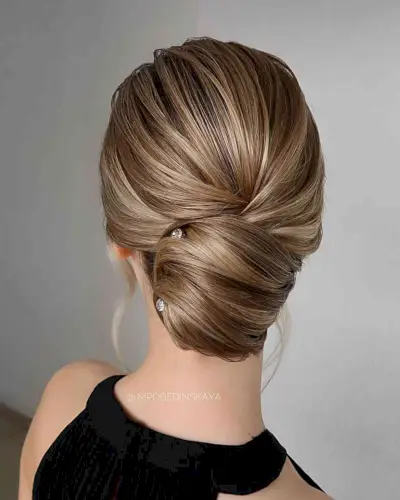 Modern bun updo for medium hair