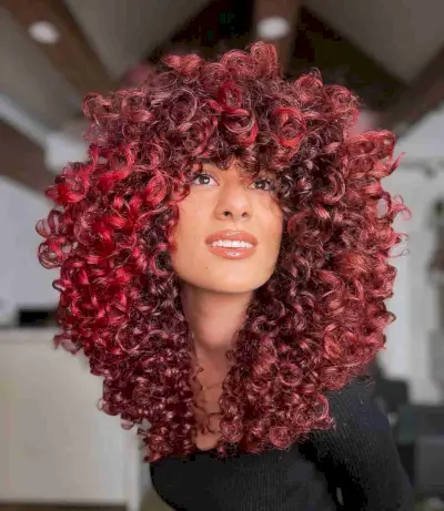 Naturally curly red shoulder length hair