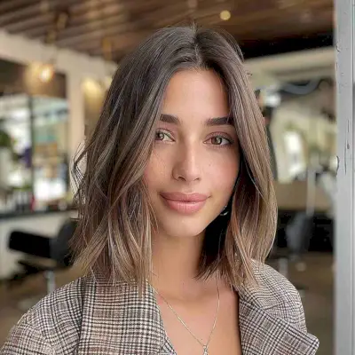 Shoulder-Length Middle Part Lob Haircut