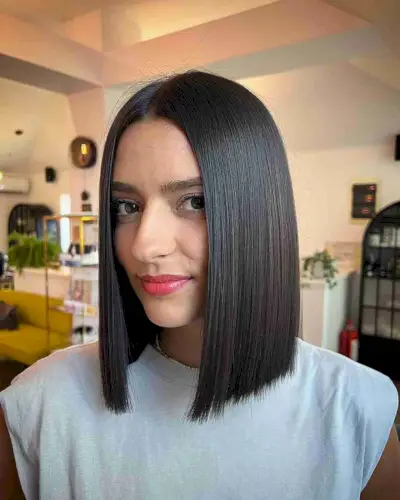 Straight middle part shoulder length