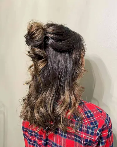 Trendy top messy bun shoulder length hair
