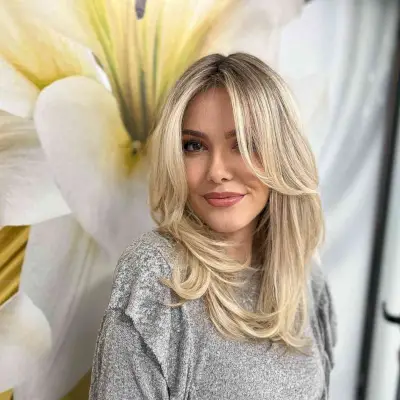 Mid-Length Soft Blonde Face-Framing Layers