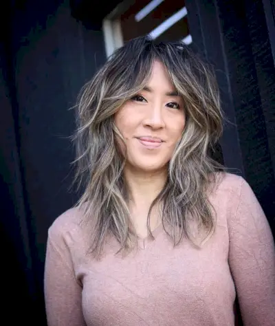 Medium-Length Shag with Face-Framing Layers for Oval Faces