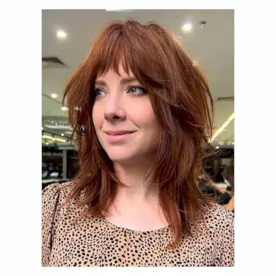 Medium Haircut with Choppy Layers for Face-Framing