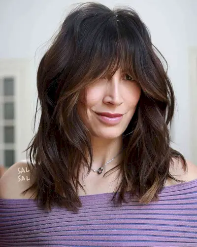Face-Framing French Bangs for Mid-Length textured hair