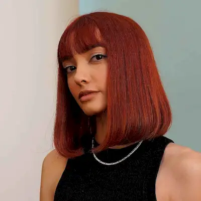 Sassy medium-length bob for thick hair and bangs