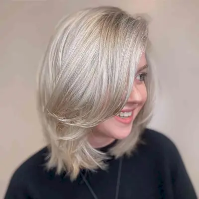 Long Soft Layers on Shoulder-Length Hair for Oval Faces