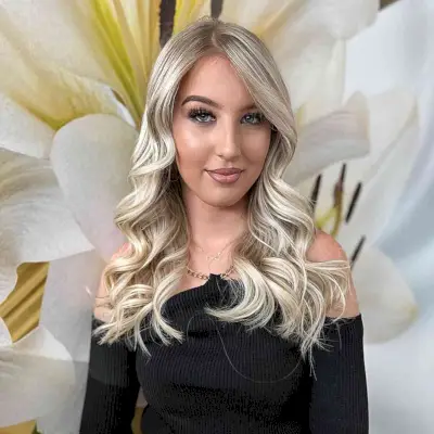 Mid-Length Chop with an Off-Center Part for Oval Faces