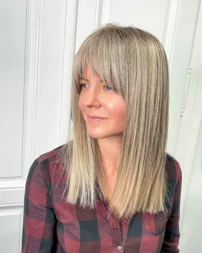 Mid-Length Blunt Cut with a Curtain Fringe