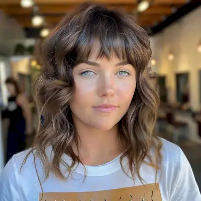 mid-length shag with short blunt bangs