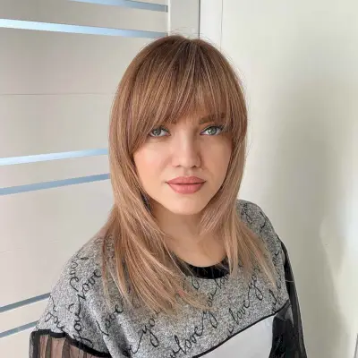 straight face-framing layers with bangs