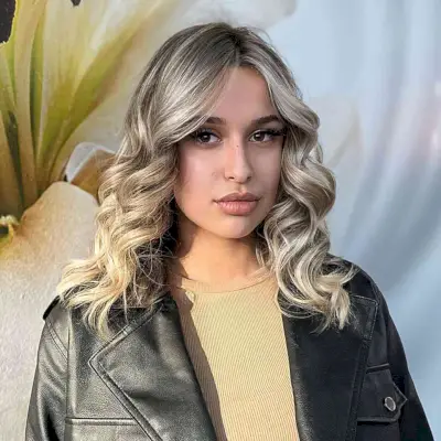 Mid-Length Middle-Parted Curled Waves for women in their 20s