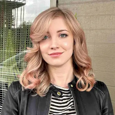 Medium-Length Wavy Hair with Sweeping Bangs