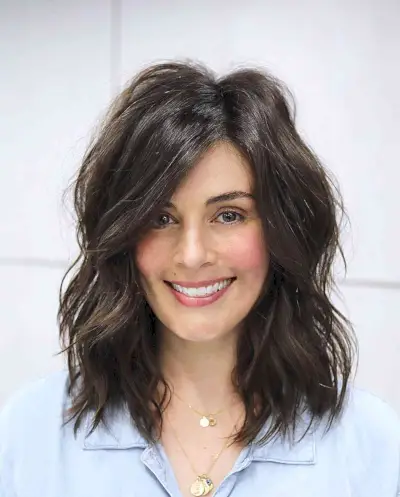 Modern Collarbone-Length Side Parted Tousled Cut
