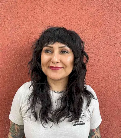 Layered Mid-Length Cute Shag Cut with Bangs for women with thinning hair