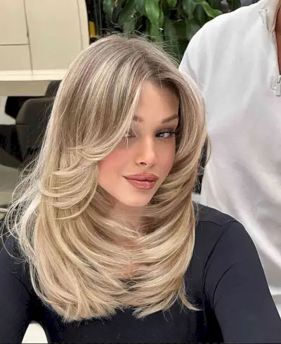 Feathery Layers on Mid-Length Blonde Hair