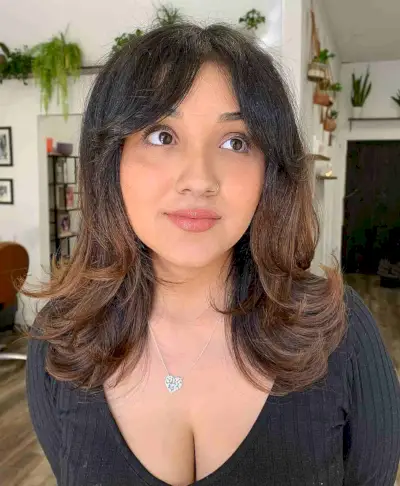 Medium Voluminous Bouncy Layers with Curtain Bangs