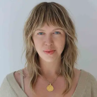 Mid-Length Messy Lob with Shaggy Layers and Bangs