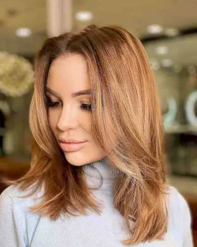 Voluminous blow out medium-length layers