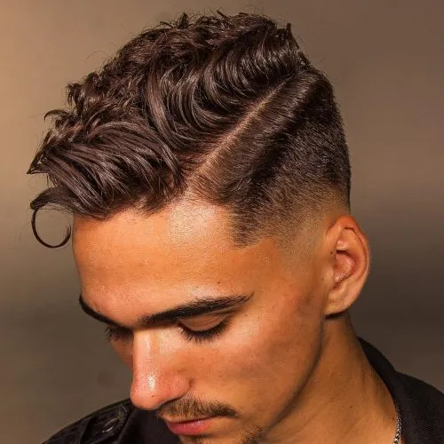 25 coupes de cheveux à décoloration élevée les plus propres pour hommes en 2026' title=