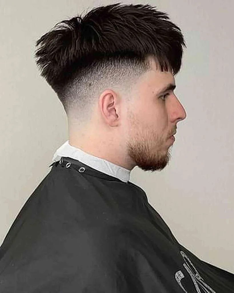 25 coupes de cheveux à décoloration élevée les plus propres pour hommes en 2026' title=