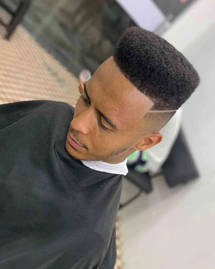 Sharp High Top Fade Cut' title=