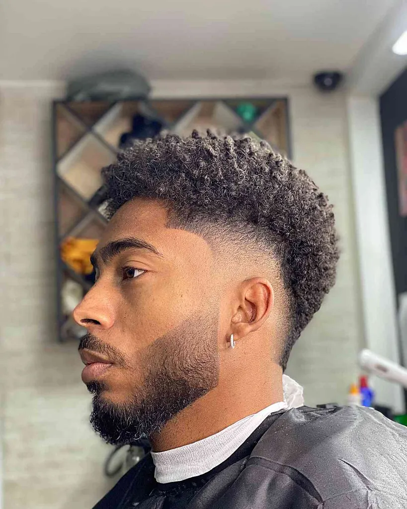 Curly Faux Hawk + Burst Fade' title=