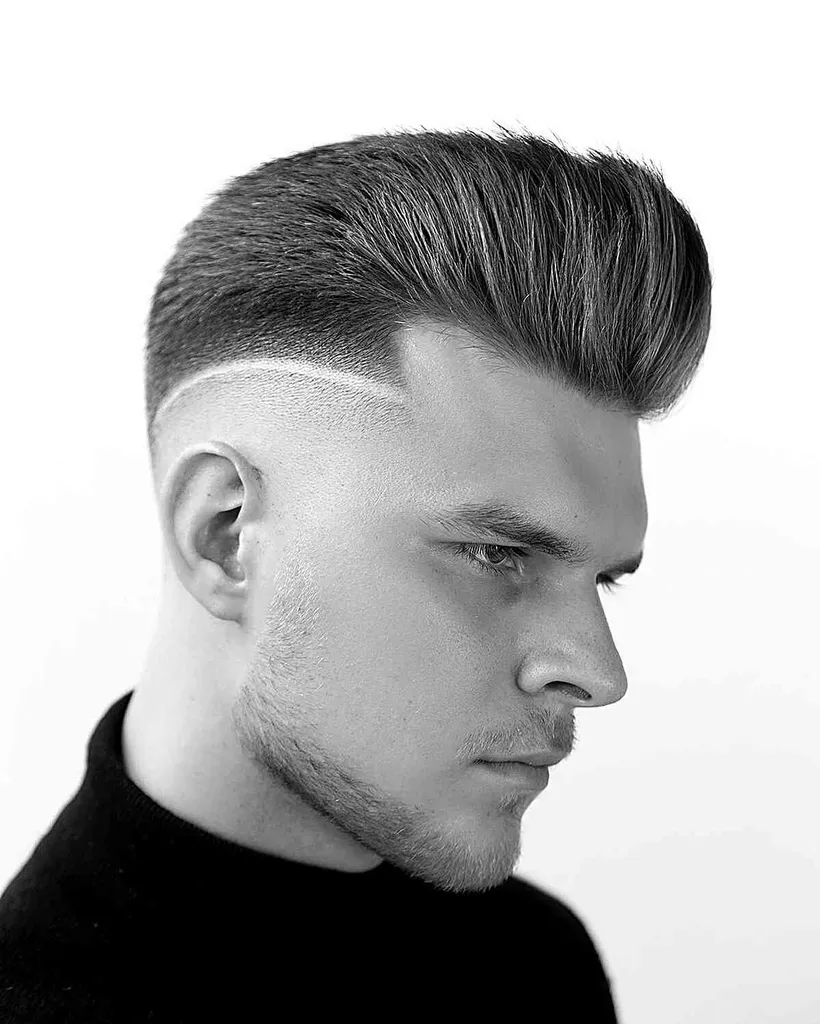 Pomp Fade con un design a linea chirurgica per ragazzi con la barba sottile' title=