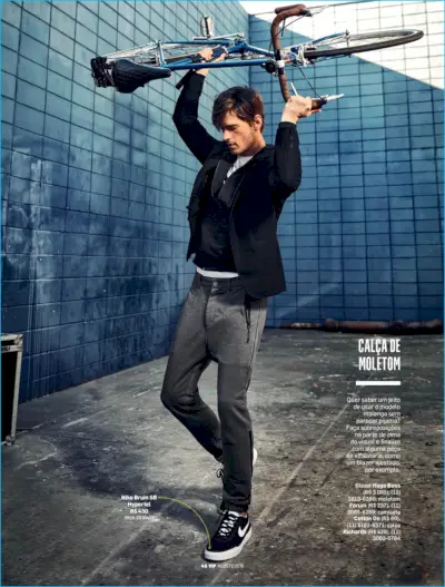 Álvaro Casavecchia transmite un oraș cool, îmbinând un blazer Hugo Boss cu stiluri sportive.