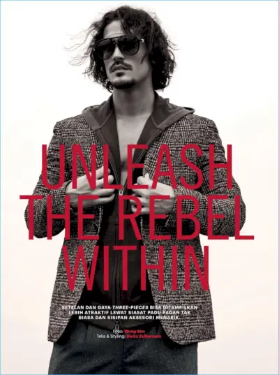 Apparendo in un editoriale per Esquire Indonesia, Gustavo Krier indossa una felpa Givenchy, un blazer Emporio Armani, pantaloni BOSS Hugo Boss e occhiali da sole Saint Laurent.