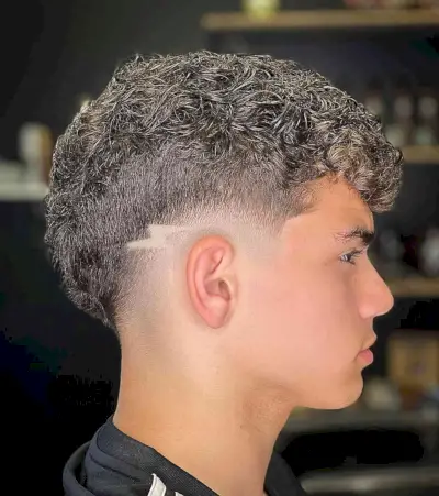 Taper Fade Haircut with a Lighting Bolt Design