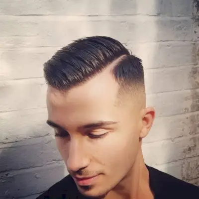 High Taper Fade with Shaved Part