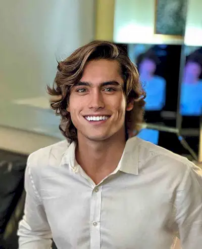 Side-Parted Long Wings Haircut with Layers for Men