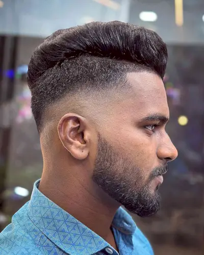 Bald Fade with a Disconnected Top for Men with a beard and handsome style
