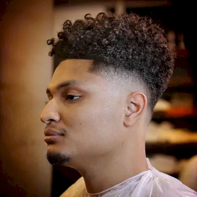 Low Skin Fade for Curly-Haired Men