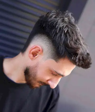 Dark Brown Mohawk with a High Fade for Men