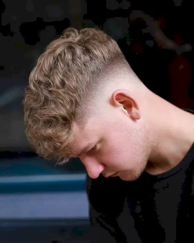 Fresh Blonde Waves with a High Fade