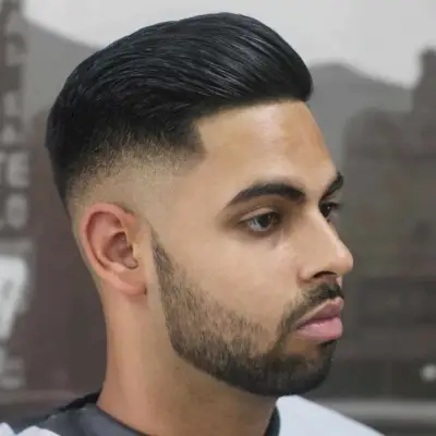 High fade + slick back