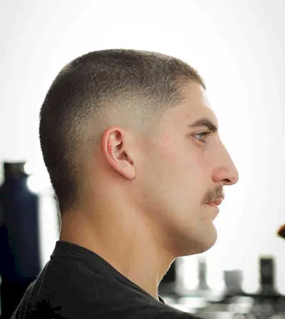 Low-Maintenance Short Buzz Crop with Burst Fade Cut on Guys