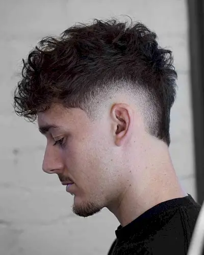 Burst Faded with a Messy, Curly Top for Men