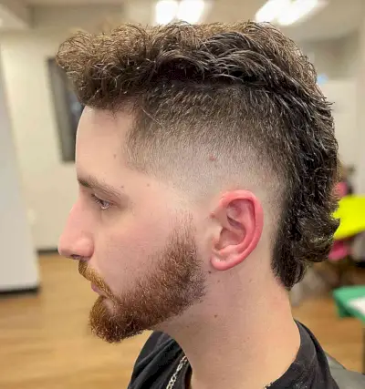 Mohawk Undercut Burst Fade and Beard for Guys
