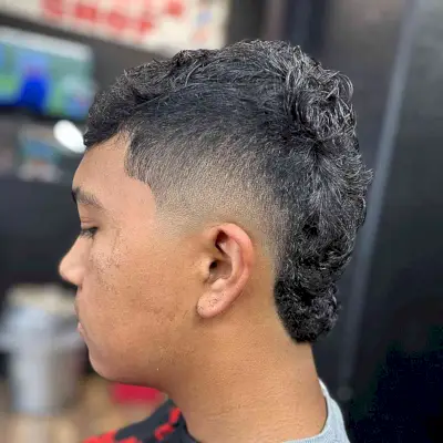 Short-Length Textured Burst Taper Fade Style on Guys