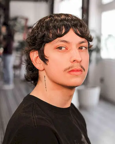 Winged Choppy Mullet with Curtain Bangs for Modern Men