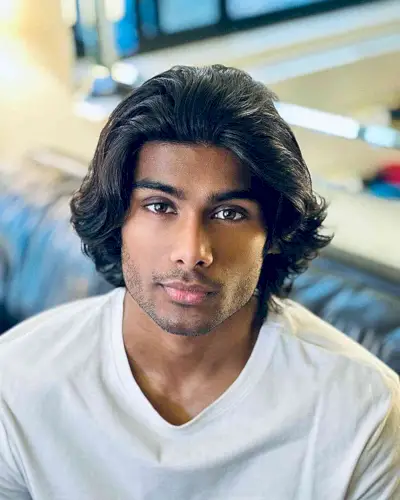 Combed Back Wings Hairstyle on Guys