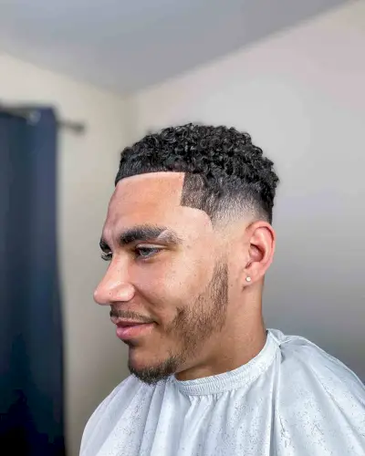 Mini Quiff on Curled Hair for a Man