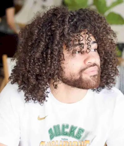 Layered Cut with Defined Curls for Guys