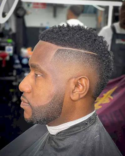 Skin Fade Curly Frohawk with Line-Up for Men