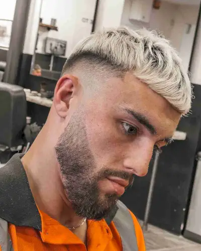 Platinum Blonde Top with a Drop Fade Cut