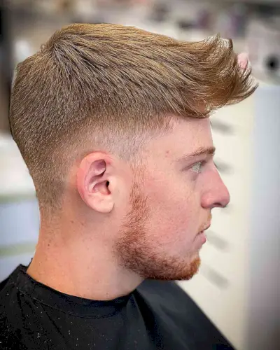 Choppy Vintage Faux Hawk with Low fade for guys