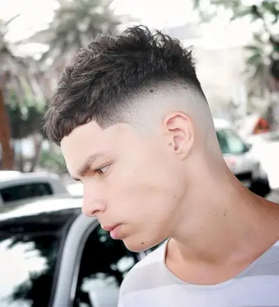 Messy brush military style with skin fade